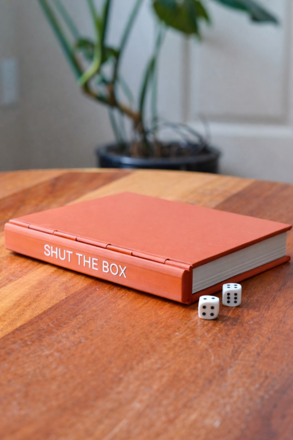 Juego libro "Cierra la caja"