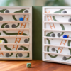 Juego Libro "Serpientes y escaleras"